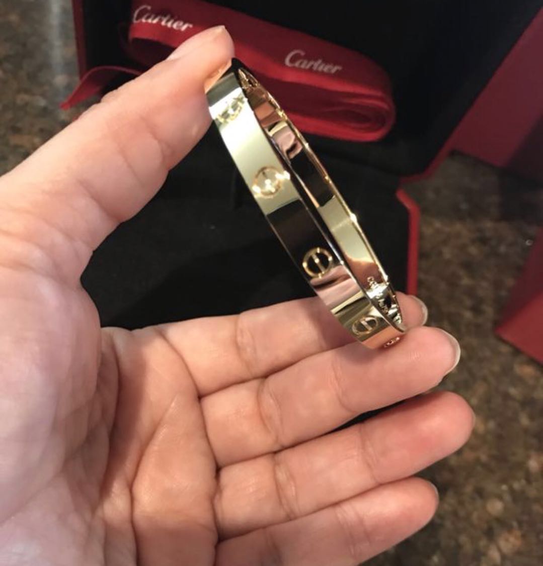 is the cartier love bracelet solid gold