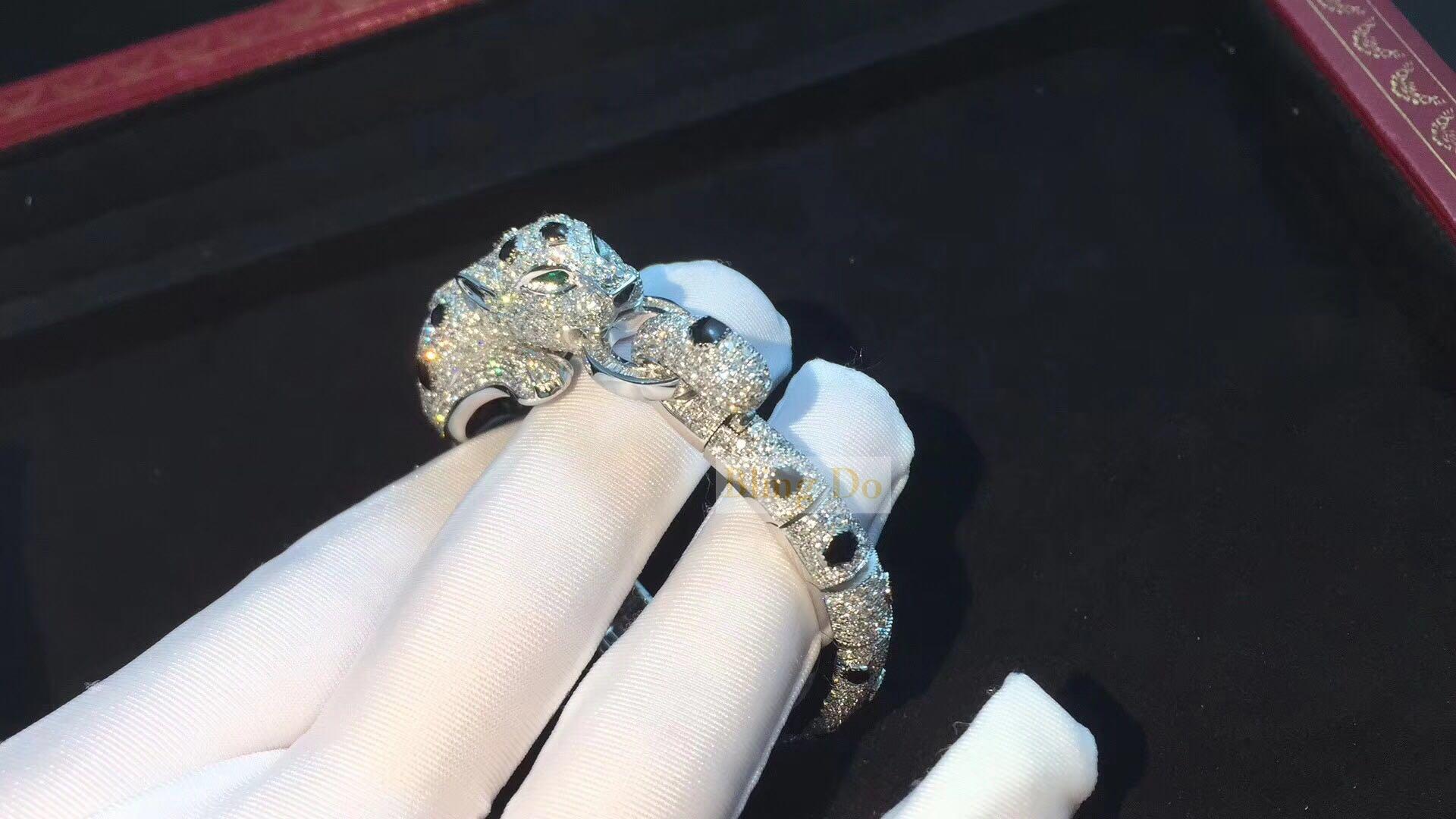 Panthère de Cartier bracelet 18K yellow gold set diamonds, onyx and Emeralds