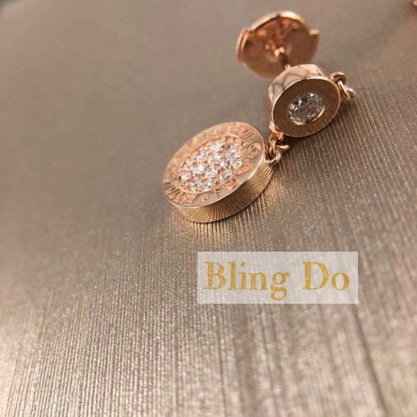 BVLGARI 18 kt rose gold earrings set with pave diamonds